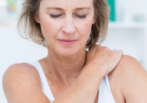 Chiropractic Coon Rapids MN Woman Shoulder Pain