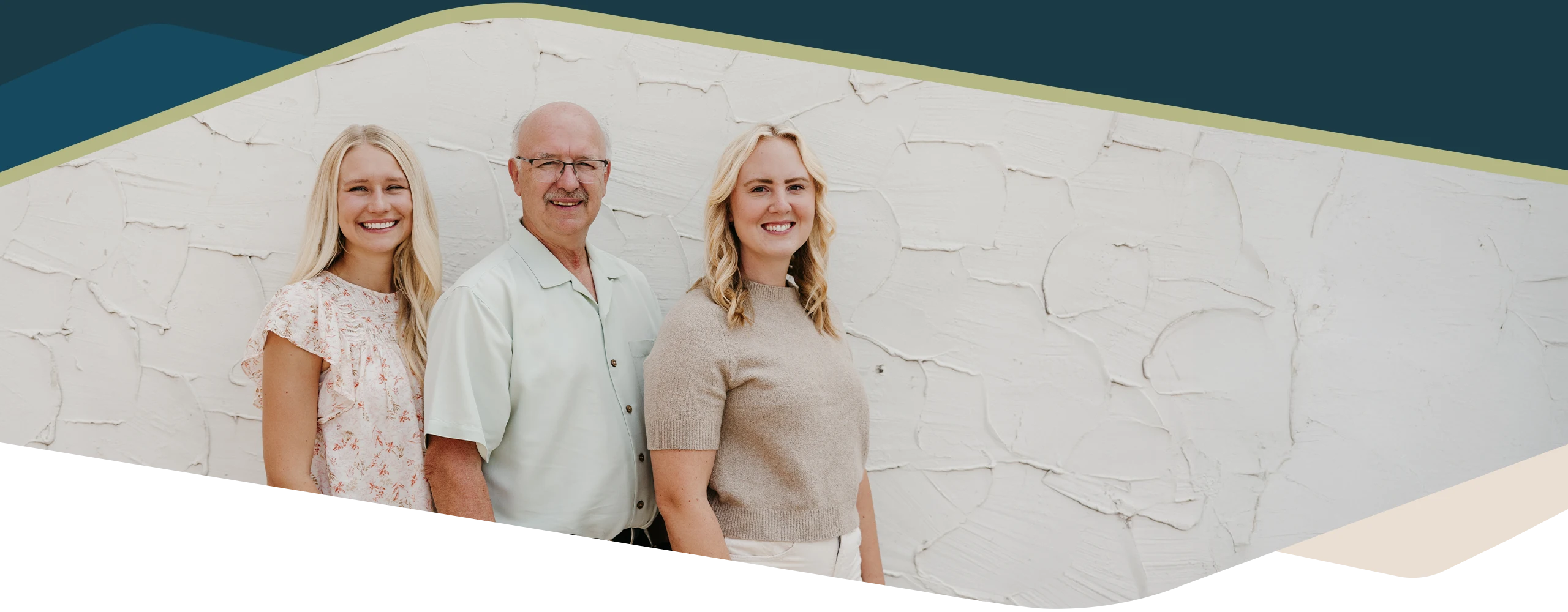 Chiropractor Coon Rapids MN Kayla Naess, Kenneth Ruf, And Rae Beaver Chiropractors Kayla Naess, Kenneth Ruf, And Rae Beaver Smiling In Front Of White Wall